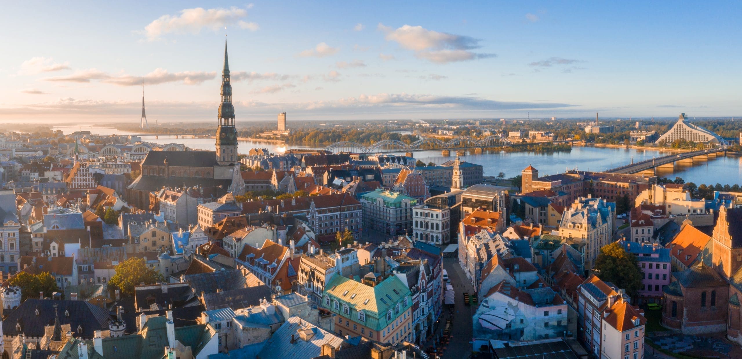 Aerial shot of the old town of Riga in Lativa during a beautiful sunset IBG Travel provides services in Riga